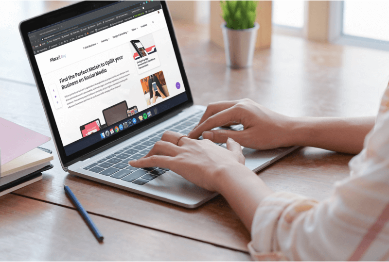 Mockup Of A Woman Working On A Macbook Pro At Home