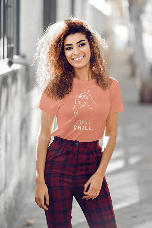 Mockup Of A Smiling Young Woman Wearing A T Shirt On The Street
