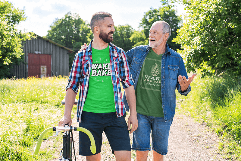 Mockup Of A Son And Father Wearing Matching T Shirts On A Sunny Day