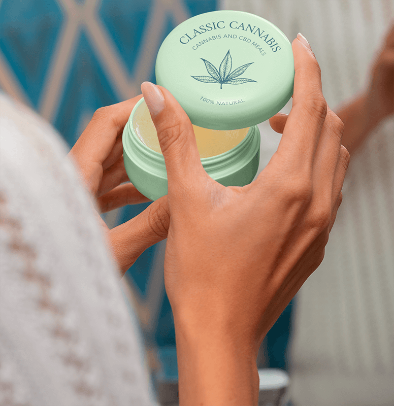 Mockup Of A Woman Holding A Cosmetic Jar For Cannabis Products