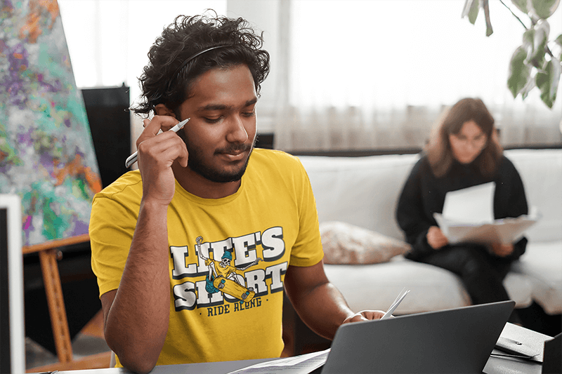 T Shirt Mockup Of A Customer Service Worker At His Desk