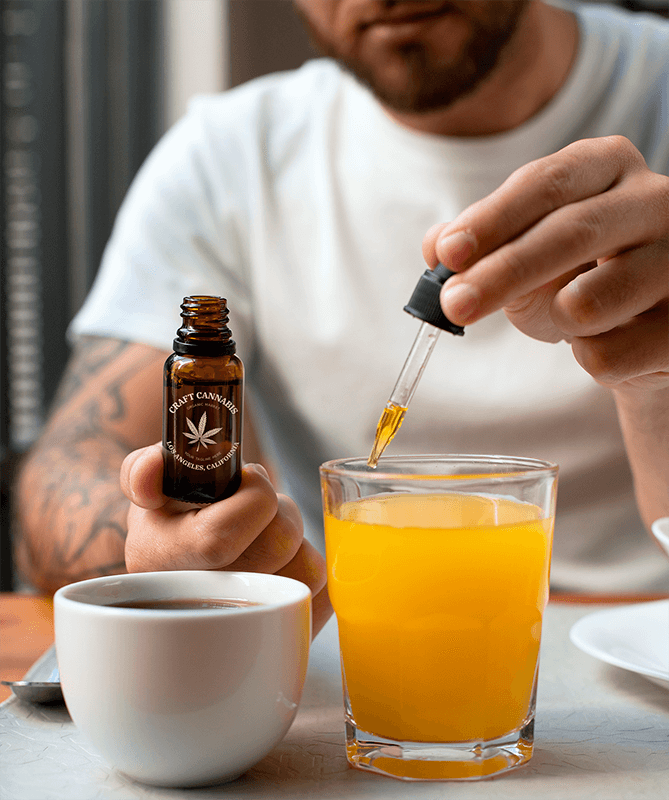 Dropper Bottle Mockup Of A Man Using His Cbd Oil