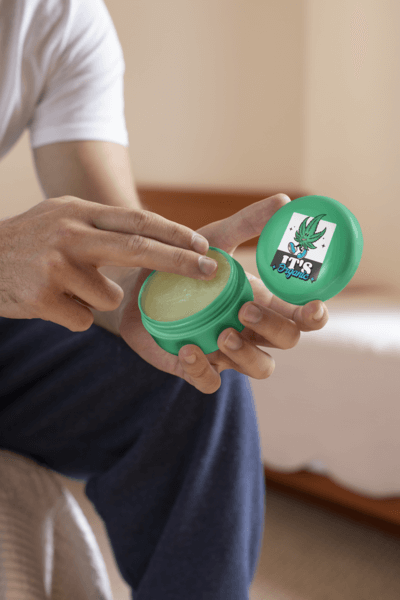 Mockup Featuring A Man Opening A Cannabis Infused Salve Jar 32113