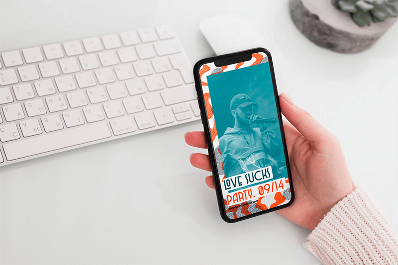 Mockup Featuring A Woman S Hand Holding An Iphone 11 Pro Over A Neat Desk