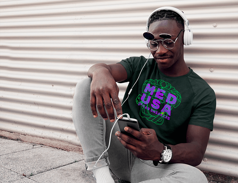 T Shirt Mockup Of A Man Listening Music On The Street