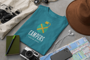 T Shirt Mockup Surrounded By Travel Accessories