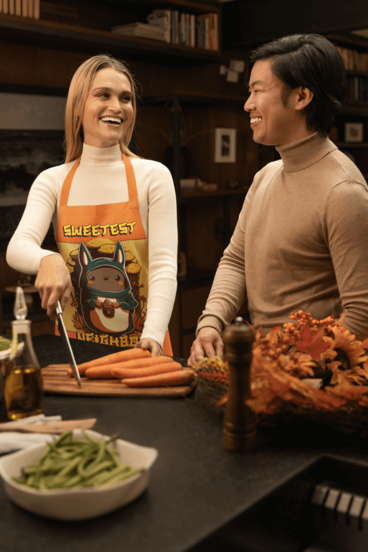 Friendsgiving Themed Mockup Featuring A Woman Cutting Vegetables In An Apron