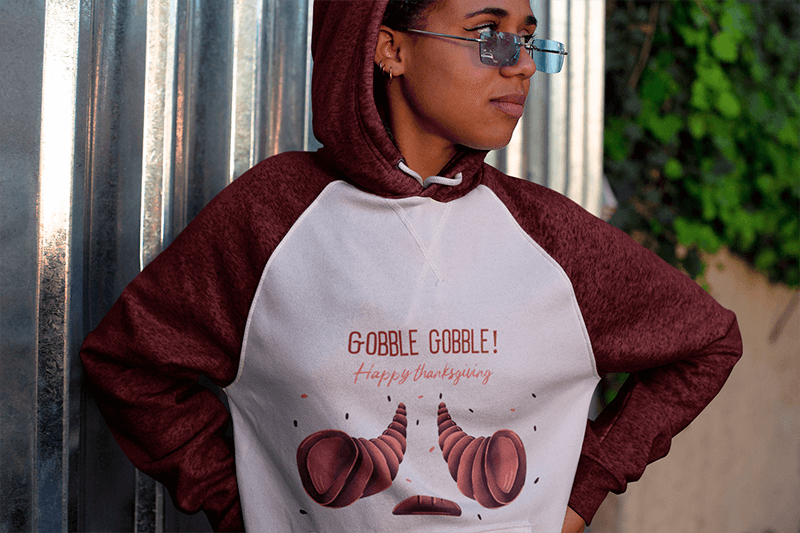 Raglan Hoodie Mockup Featuring A Girl With Glasses Looking Away