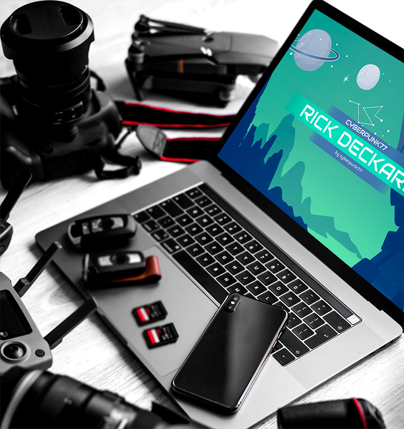 Mockup Featuring A Macbook Pro Surrounded By Photography Equipment