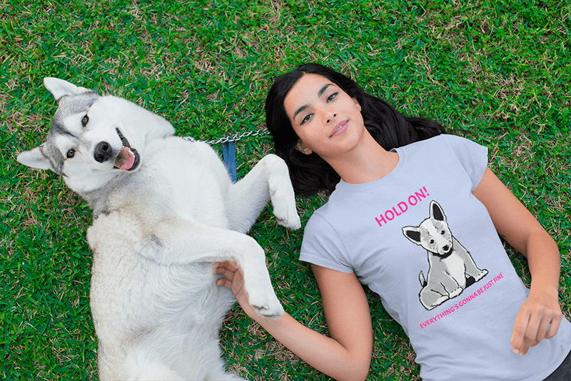 T Shirt Mockup Of A Woman Lying On The Grass With Her Dog