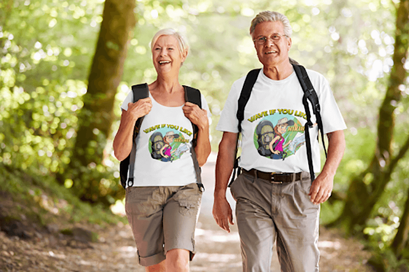 T Shirt Mockup Featuring A Senior Couple Hiking