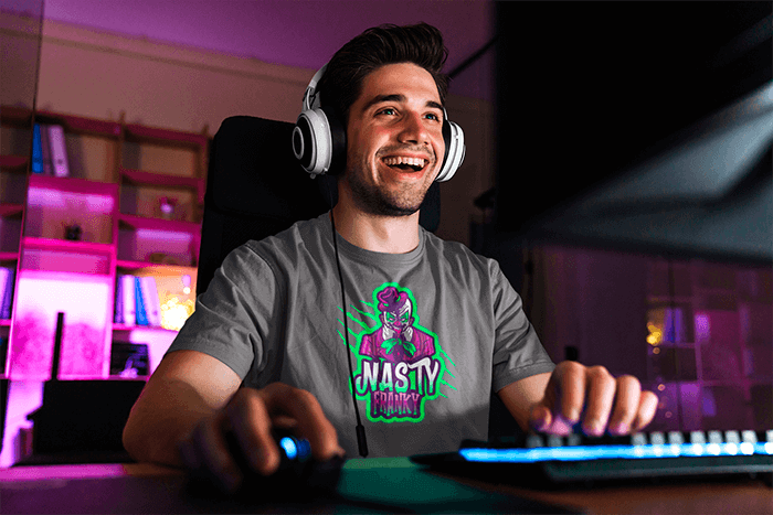 Mockup Of A Gamer Wearing A Basic T Shirt At Home