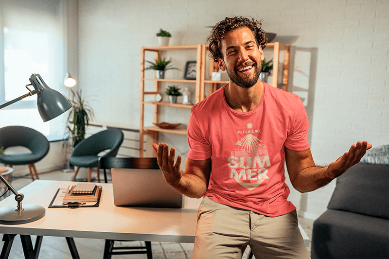 Round Neck Tee Mockup Of A Smiling Man In His Home Office