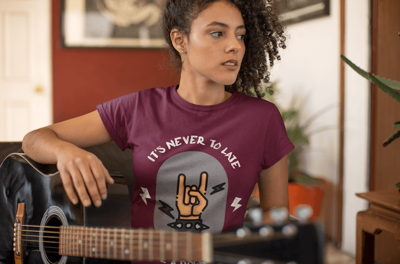 Round Neck Tshirt Mockup Of A Girl Holding An Acoustic Guitar