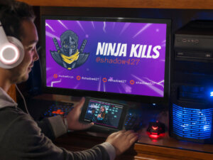 Gamer streamer checking the best Twitch tools for his channel