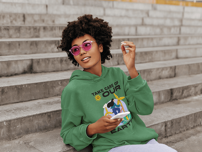 Woman Wearing A Custum Hoodie Mockup While Sitting Outside