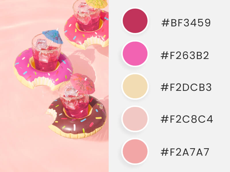 A summer color palette inspired by pink inflatables in shape of donuts