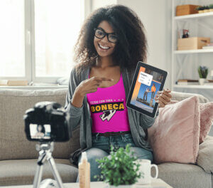 Tank Top Mockup Featuring An Influencer Woman Filming A Video Copy