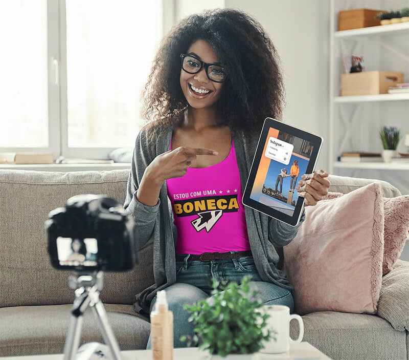 Tank Top Mockup Featuring An Influencer Woman Filming A Video Copy