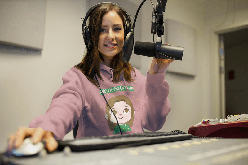 Hoodie Mockup Featuring A Podcaster Recording Content