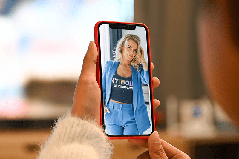 Over The Shoulder Mockup Of A Woman Using Her Iphone