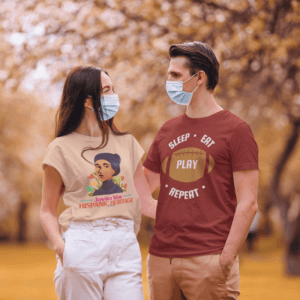 T Shirt Mockup Featuring A Couple Wearing Face Masks