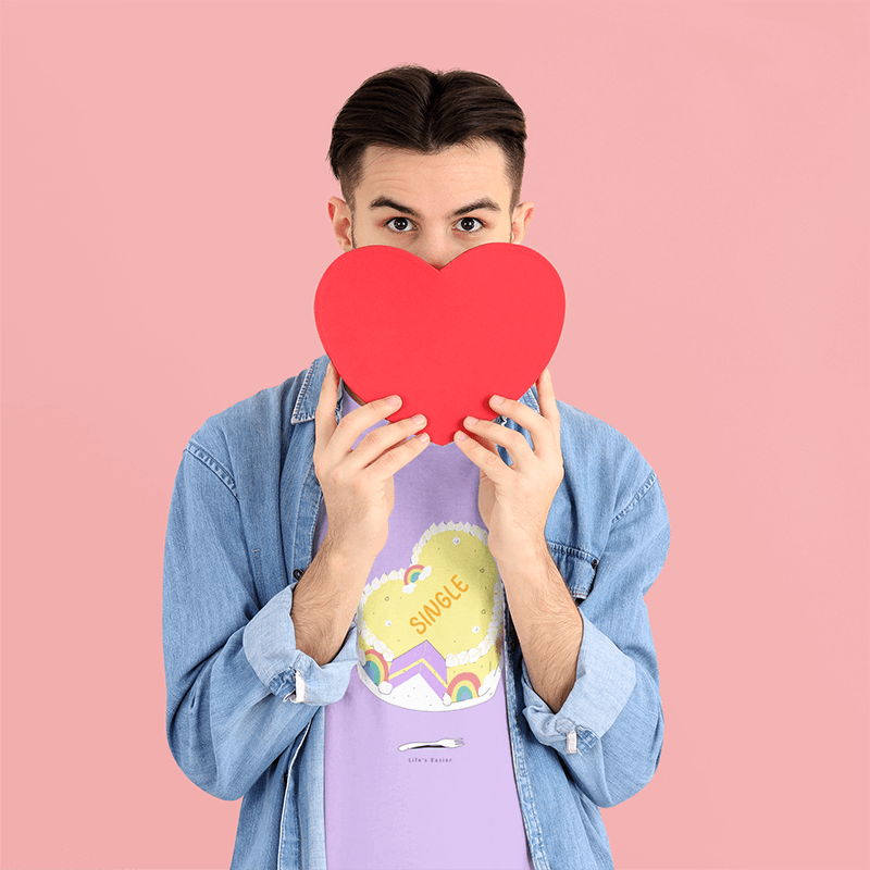 T Shirt Mockup Featuring A Man Holding A Heart Shaped Box For Valentine