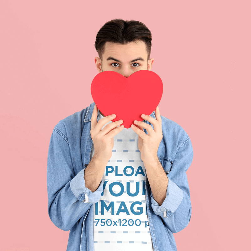 T Shirt Mockup For Valentines Day Featuring A Man Holding A Heart Cut Out