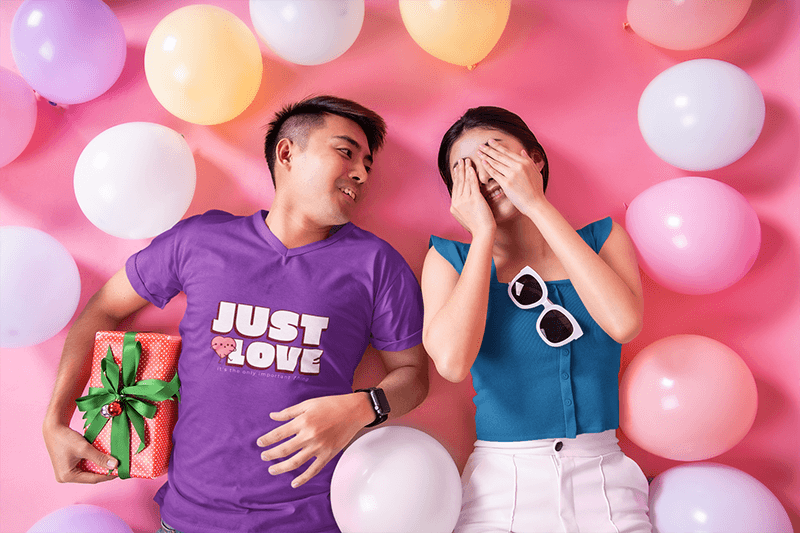 V Neck Tee Mockup Of A Man Lying Next To His Girlfriend In A Valentine S Decorated Studio