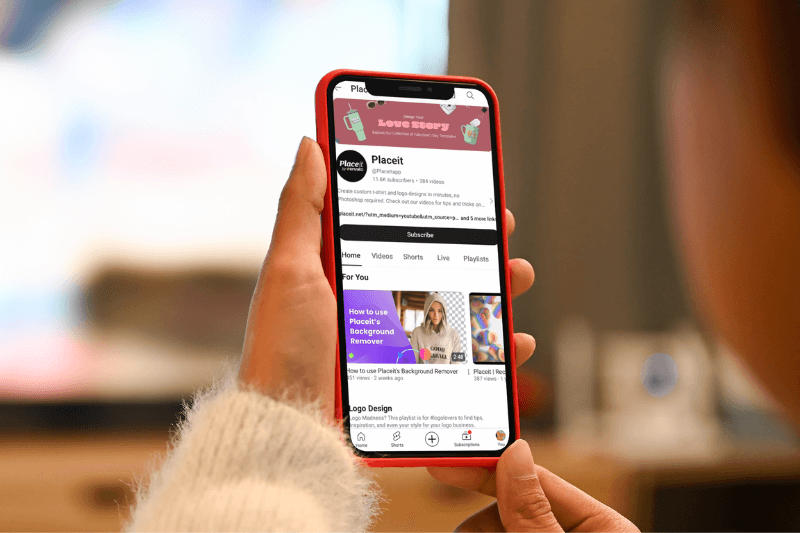 Over The Shoulder Mockup Of A Woman Using Her Iphone 11 Pro