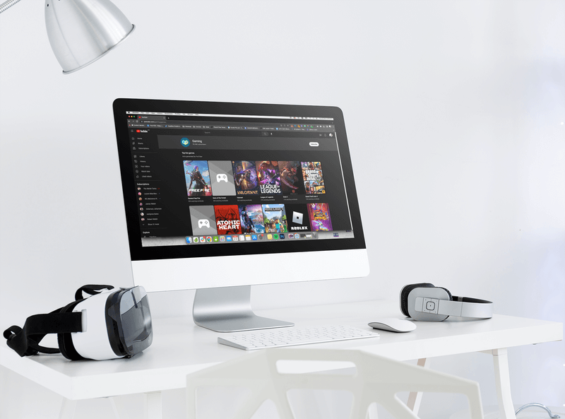 Imac Mockup Featuring A Vr Headset And A Pair Of Headphones Placed On A Desk