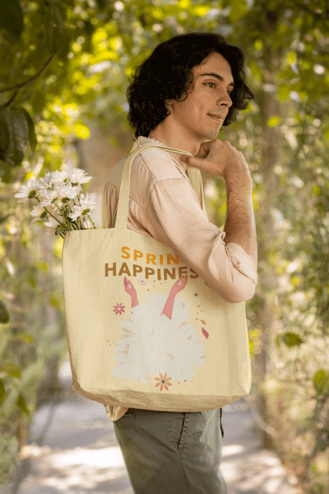 Cottagecore Themed Mockup Featuring A Young Man Carrying A Tote Bag With Flowers M18724