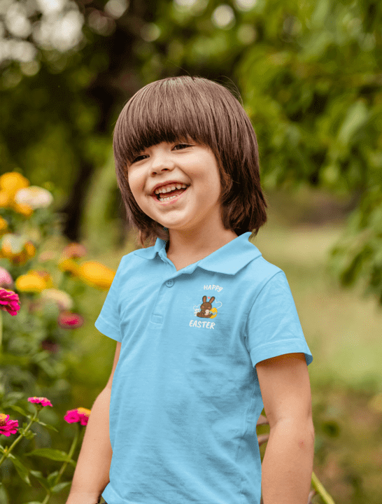 Polo Shirt Mockup Of A Happy Kid Posing Beside Some Flowers M16569 R El2