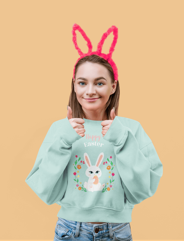 Sweatshirt Mockup Of A Young Woman Posing In A Studio While Wearing Bunny Ears