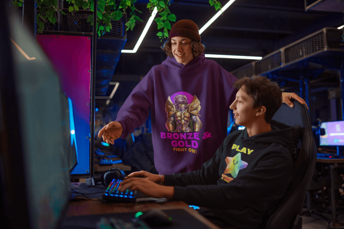 Hoodie Mockup Featuring Two Teenagers Playing Videogames At A Gaming Center M10859 R El2 (1)