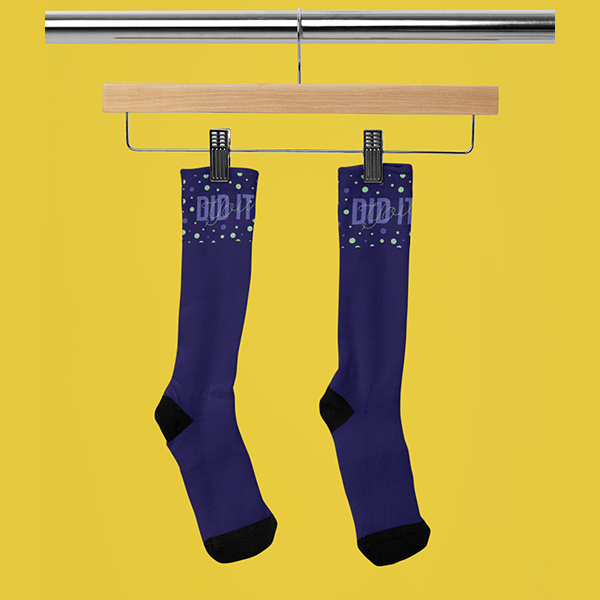 Mockup Of A Pair Of Sublimated Socks Placed On A Wooden Hanger