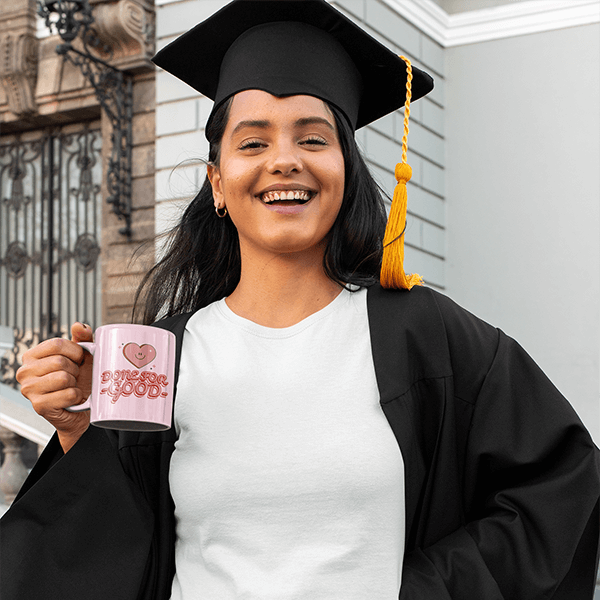 T Shirt Mockup Featuring A Happy Graduate With A Coffee Mug