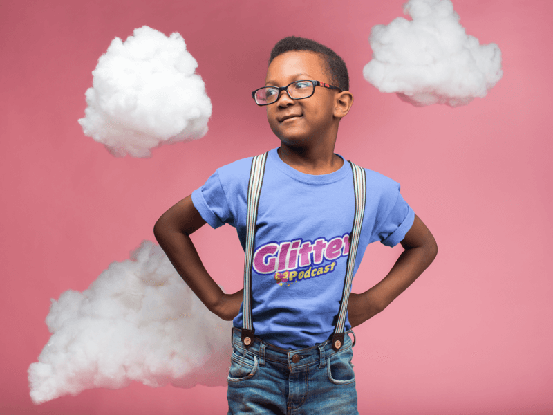 Black Kid Wearing A T Shirt Mockup And Glasses While Standing In A Pink Room With Clouds A19727