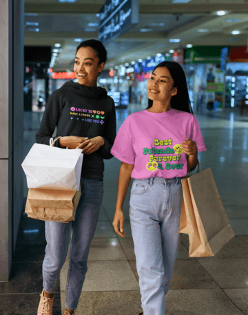 T Shirt And Hoodie Mockup Of Two Female Friends Shopping At A Mall 44401 R El2