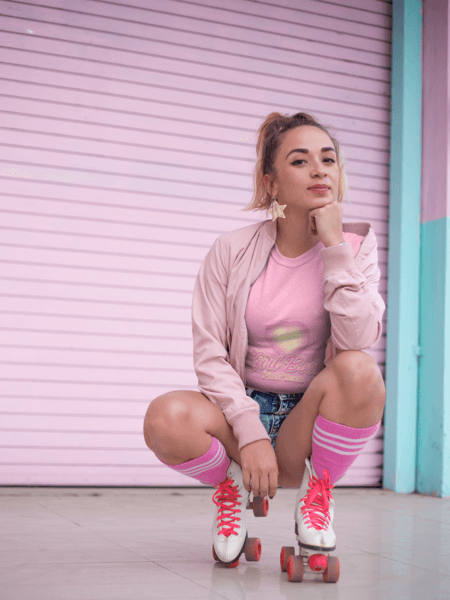 Trendy Woman With Roller Skates Wearing A T Shirt Mockup In A Pink Environment A18561