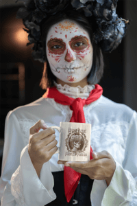 11 Oz Coffee Mug Mockup Featuring A Woman With A Catrina Face Makeup