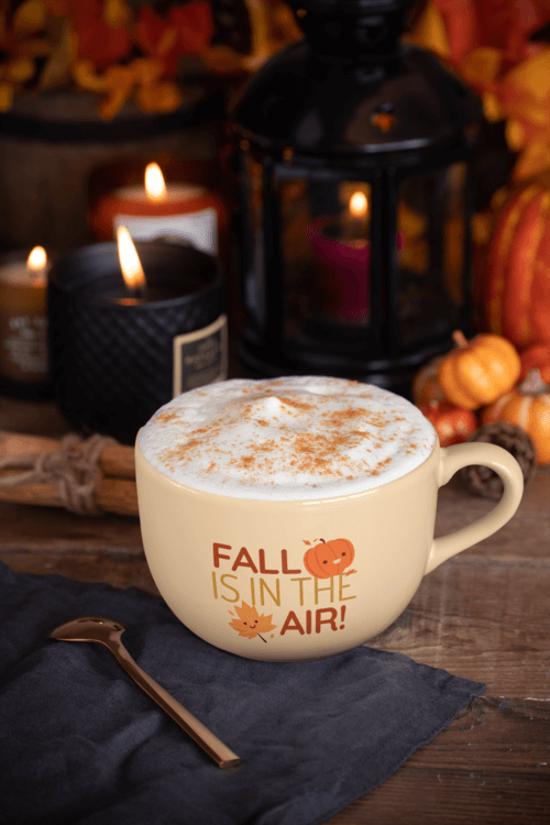 24 Oz Mug Mockup With Thanksgiving Decorations In The Background 29169