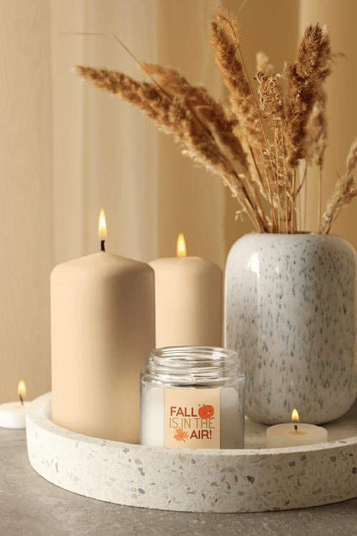 Mockup Of A Candle Featuring A Reed Plant