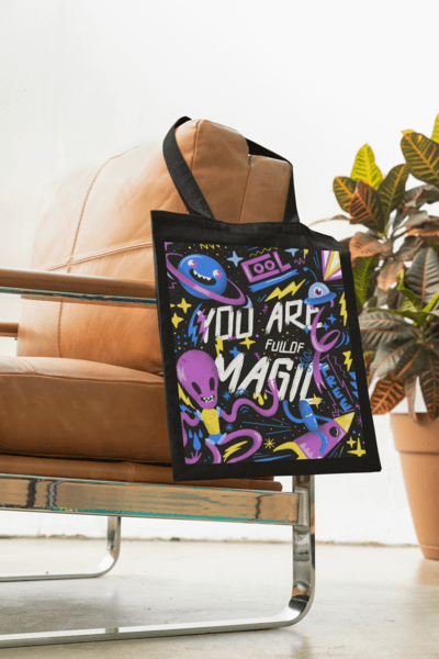 Mockup Of An Embroidered Tote Bag Hanging From An Armchair