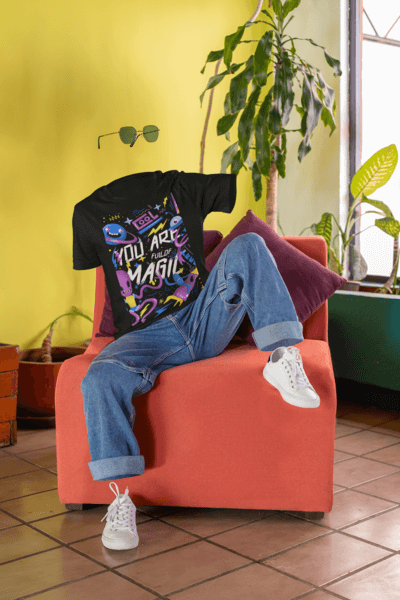 Round Neck Tee Mockup Of A Ghosted Man With Sunglasses Sitting On A Couch