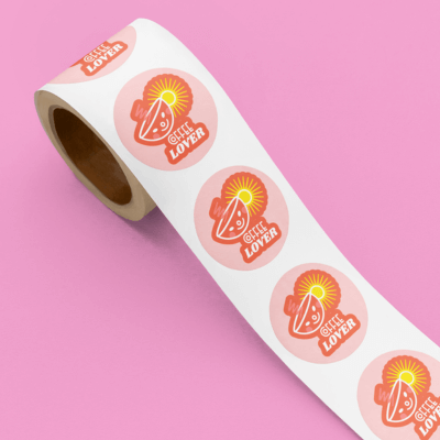 Sticker Roll Mockup Featuring A Brand Coffee Themed Sticker