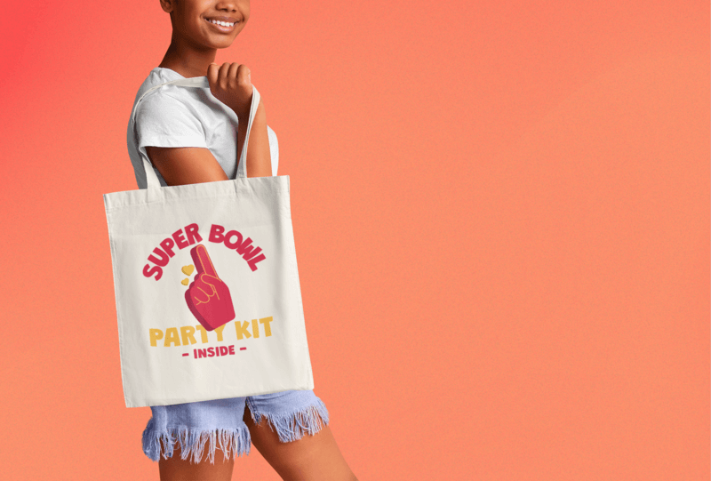 Cropped Face Mockup Of A Woman With A Sublimated Tote Bag