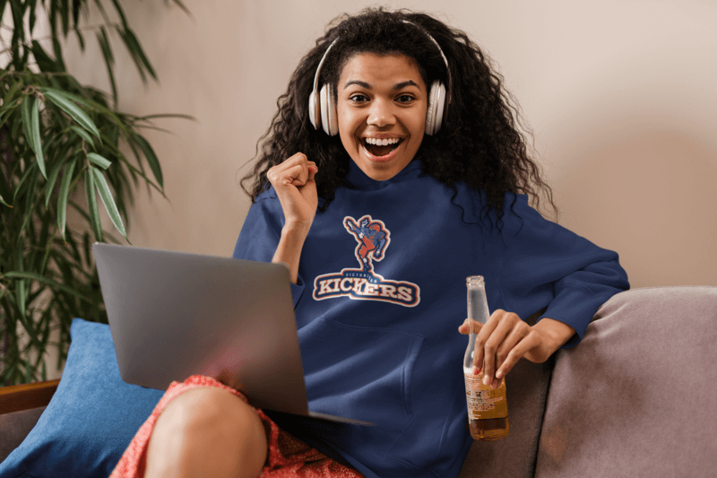 Pullover Hoodie Mockup Of A Cheerful Woman With Headphones And A Beer