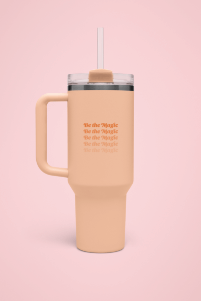 Mockup Of A Stanley Tumbler Placed On A Rose Pink Surface