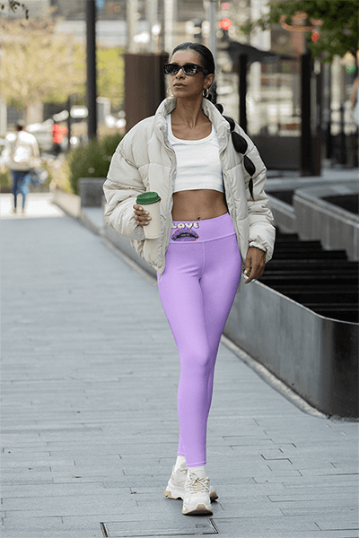 Leggings And Coffee Cup Mockup Featuring A Woman Waking On The Street